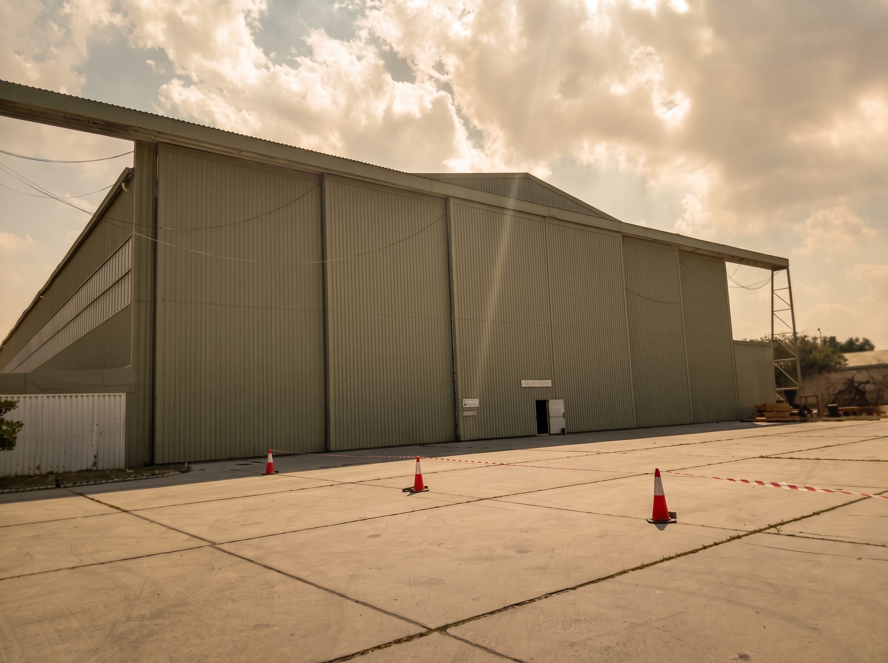 The Dolphin Air aircraft maintenance hangar at golden hour